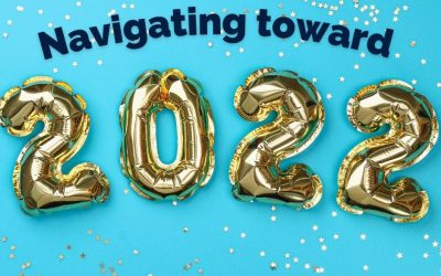 Balloons reading 2022 on a blue and glitter background. Text reads Navigating toward