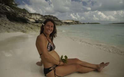 Pregnant Women on beach in the tropics