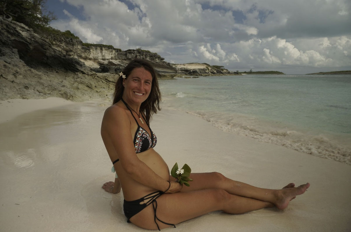 Pregnant Women on beach in the tropics