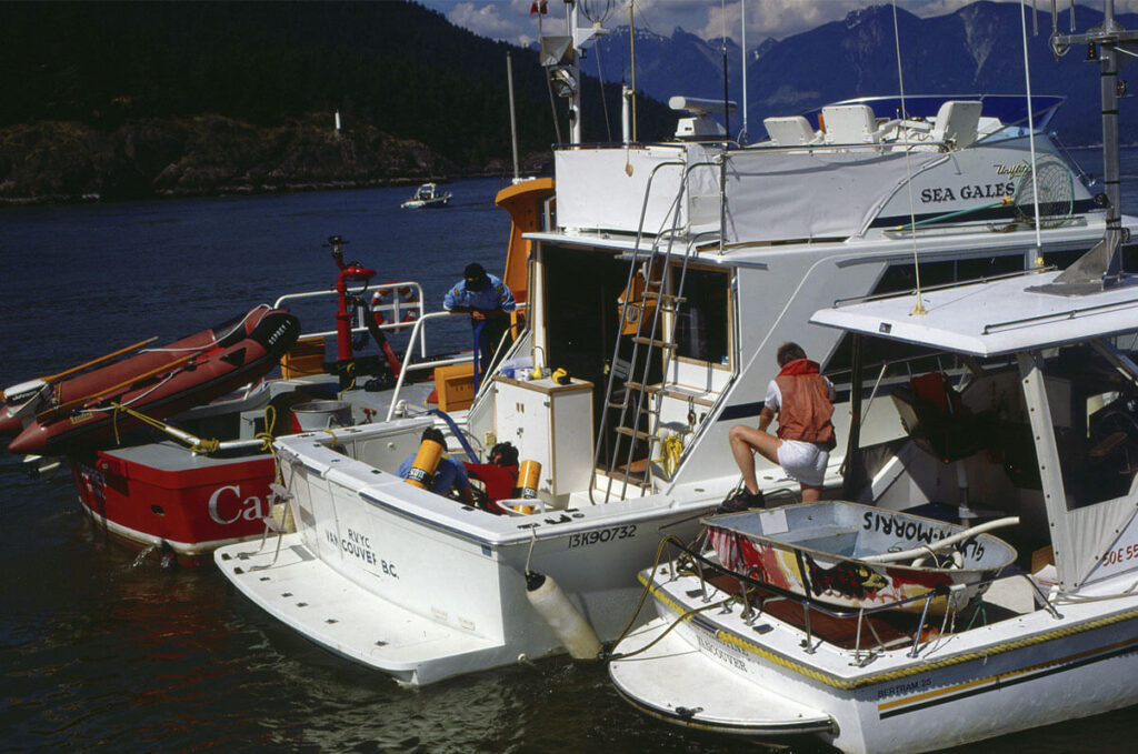 Jim McDonald and the Coast Guard assisting a disabled vessel in 1993. Credit Sea Snaps